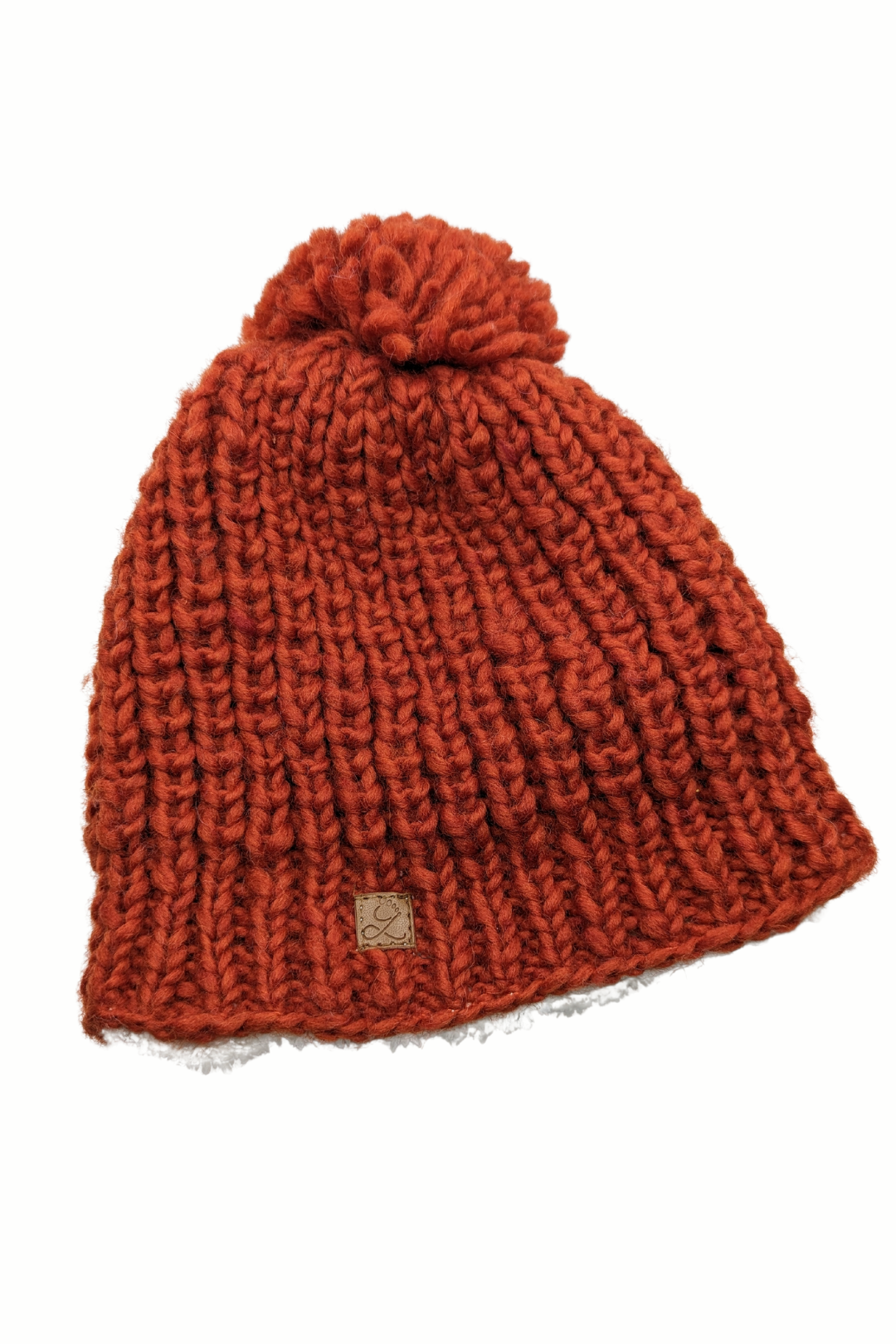 Tuque en laine doublée en polar avec pompon – chaleur et confort