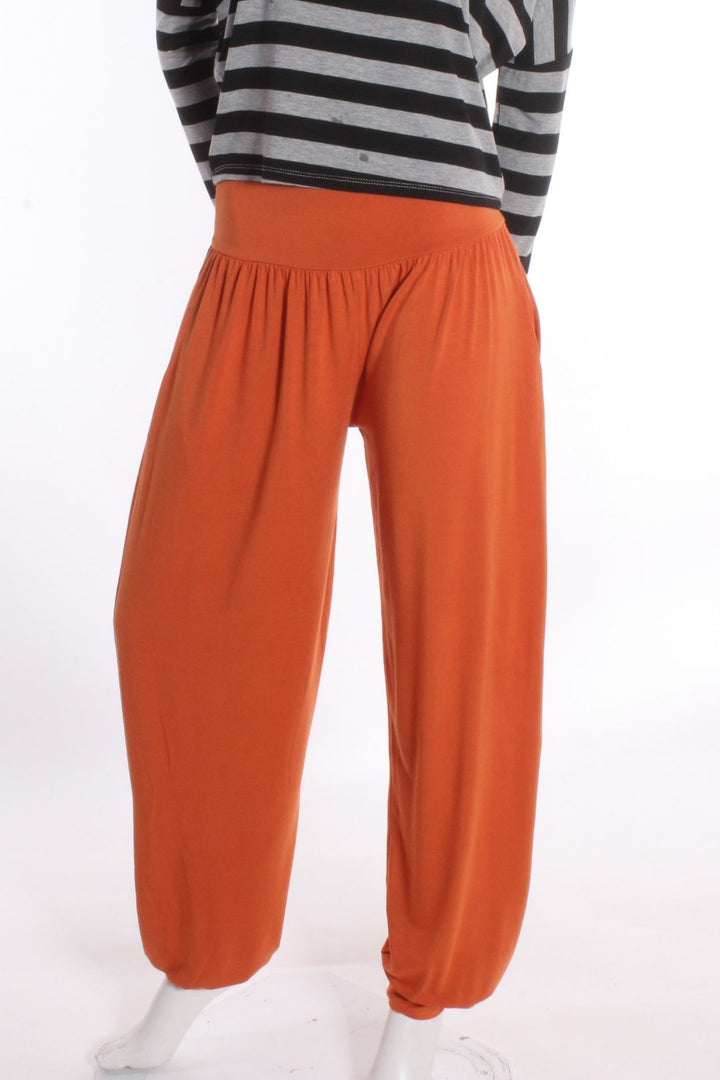 Pantalon ample Rox — Uni Orange brulé Pantalons by Riches | Roxy Lama